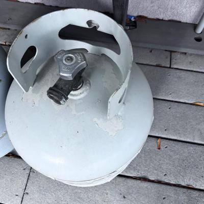 2 Partial 5 gallon propane tanks