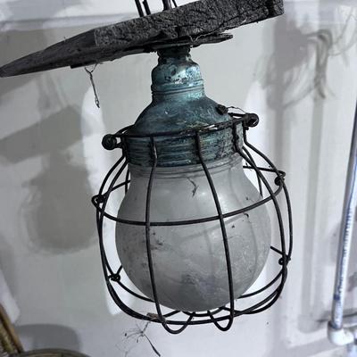Antique Warehouse Light Glass Bulb with a Wire Cage