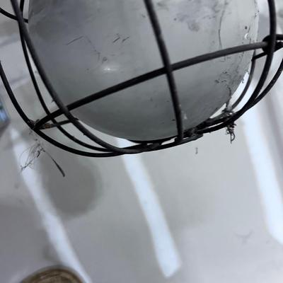 Antique Warehouse Light Glass Bulb with a Wire Cage