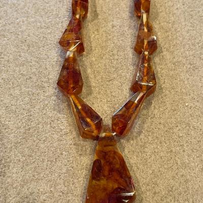 Amber color necklace and clip ons