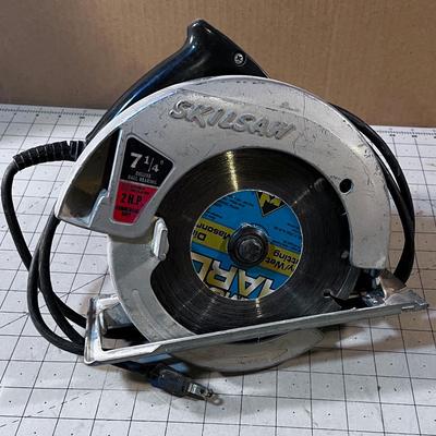 7-1/4" Skill Saw with a masonry Blade.