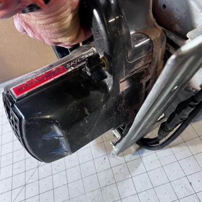 7-1/4" Skill Saw with a masonry Blade.