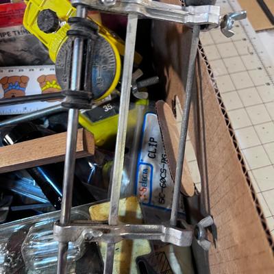 Box of Misc. Tools: Chain Saw Sharpener, Tape Measures, etc. 