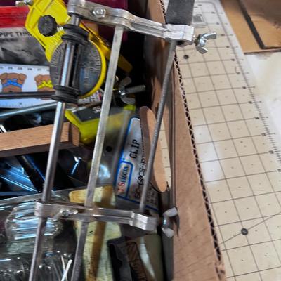 Box of Misc. Tools: Chain Saw Sharpener, Tape Measures, etc. 