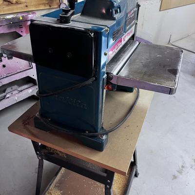 Makita Model 2012 - 12" Planer on stand. 