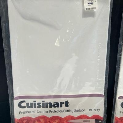 Lot 35 cutting boards & loaf pans