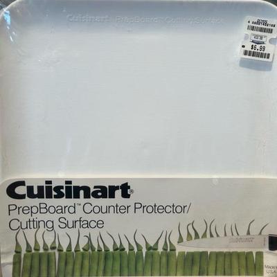 Lot 35 cutting boards & loaf pans