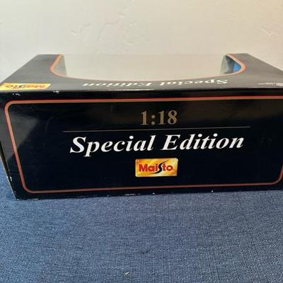 Lot 26 Maisto Die Cast Car