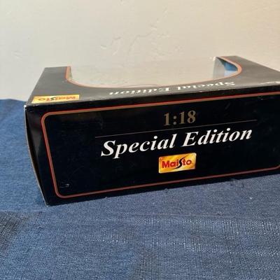Lot 27 Maisto Die Cast Car