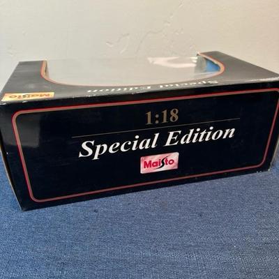 Lot 28 Maisto Die Cast Car