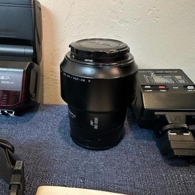 Lot 104 Minota 35 millimeter camera gear