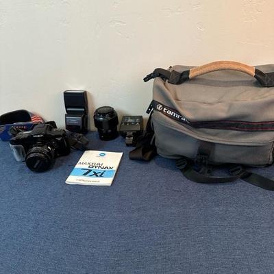 Lot 104 Minota 35 millimeter camera gear