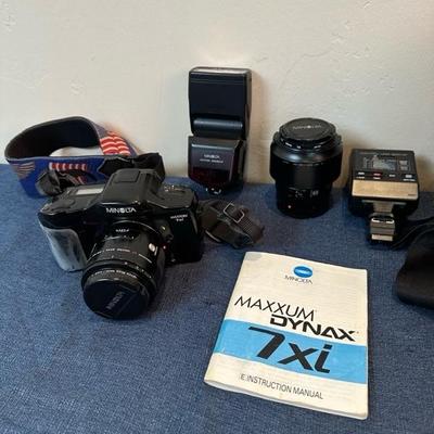 Lot 104 Minota 35 millimeter camera gear