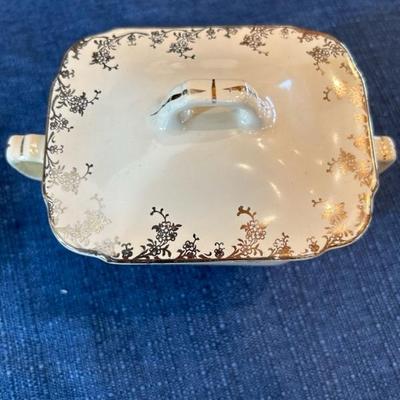 Lot 131 Homer Laughlin ivory & gold trim china set