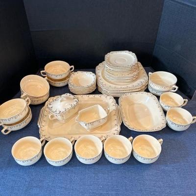 Lot 131 Homer Laughlin ivory & gold trim china set