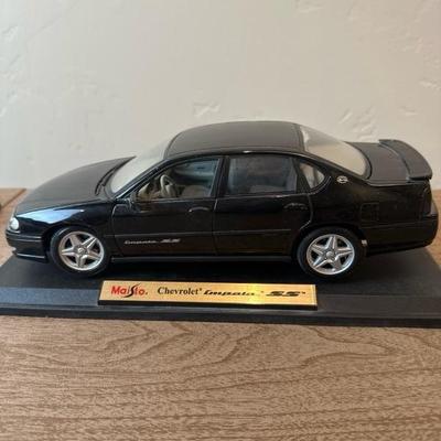 Lot 167 Two Maisto Cars 1/18 scale