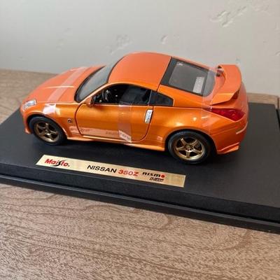 Lot 167 Two Maisto Cars 1/18 scale