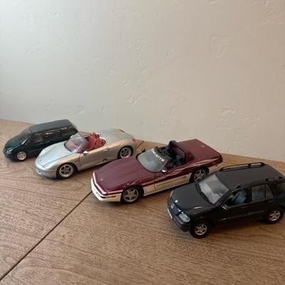 Four Maisto Cars
