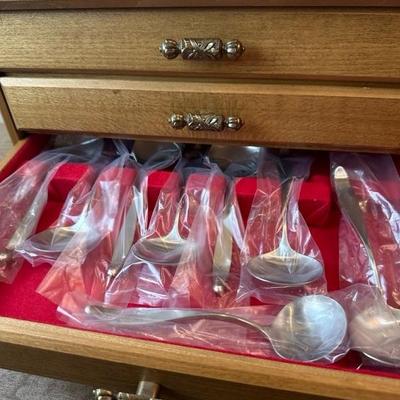 Lot 169 Lauffer Stainless Steel Flatware in wood chest