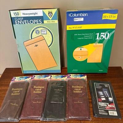 Lot 228 two full boxes of 10 x 13 clasp envelopes and four business card holders