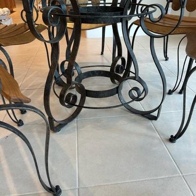 Lot 250 round glass and metal dining set with six chairs