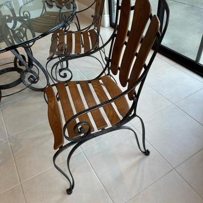Lot 250 round glass and metal dining set with six chairs