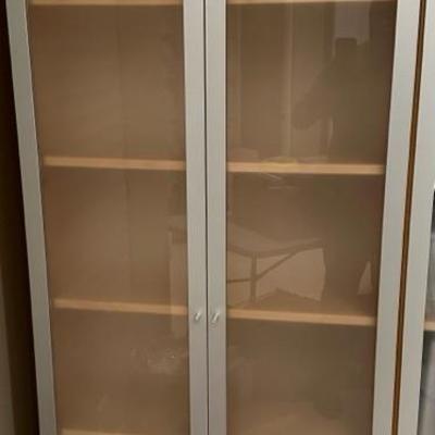 Lot 240 Six shelf frosted glass doors cabinet
