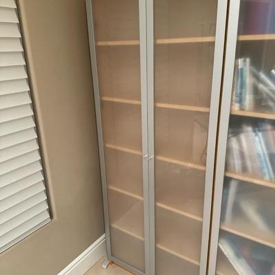 Lot 240 Six shelf frosted glass doors cabinet