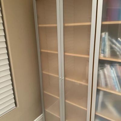 Lot 271 Six shelf frosted glass doors cabinet