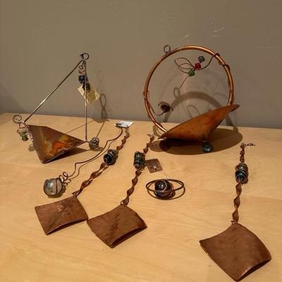 Lot 275 a collection of copper yard decor