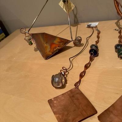Lot 275 a collection of copper yard decor