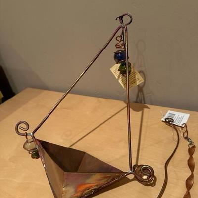 Lot 275 a collection of copper yard decor