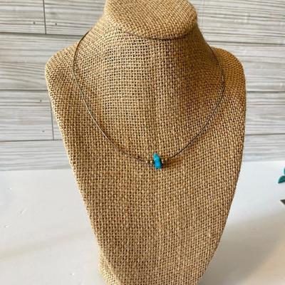 Thin silver necklace with small turquoise nugget