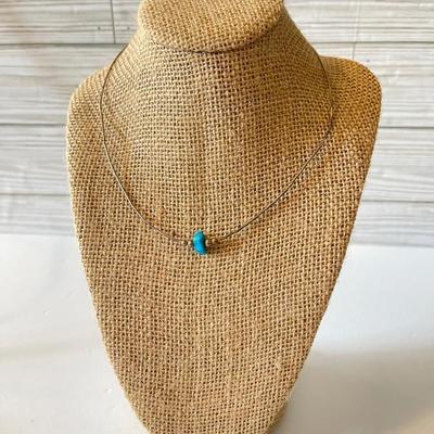 Thin silver necklace with small turquoise nugget