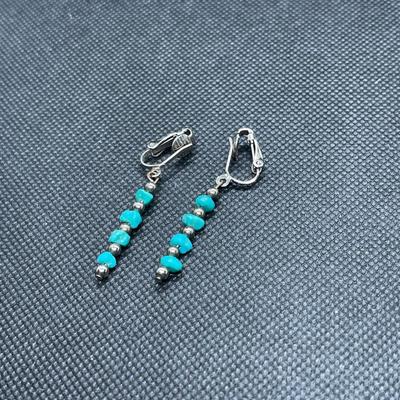 Small turquoise nugget dangle earrings. Not Sterling