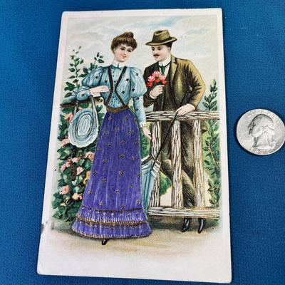 VTG. FANCY EMBOSSED COLOR POSTCARD MAN GIVING FLOWERS TO LADY, HAS GOLD EMBELLISHMENT