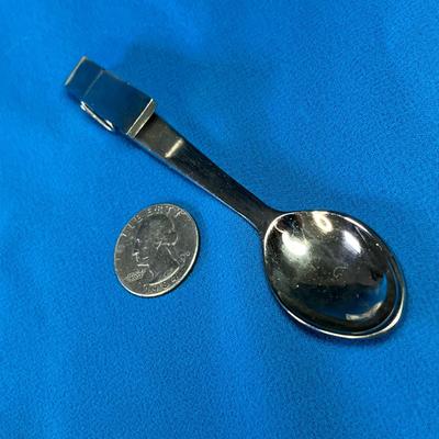 UNUSUAL METAL SPOON WITH CLOTHES PIN ON END