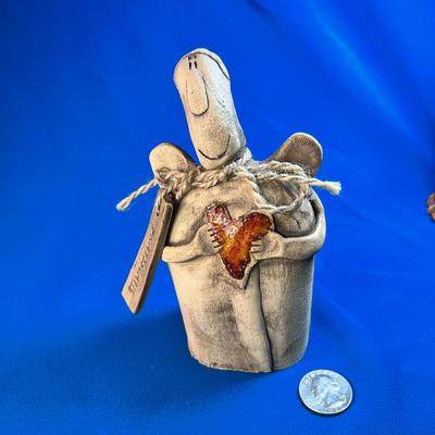 BRATISLAVA CLAY FIGURE HOLDING GLAZED HEART