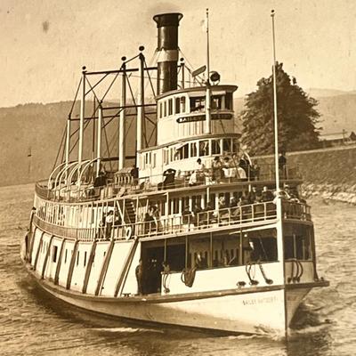 SEPIA TONE PRINT OF PHOTO OF STEAM BOAT