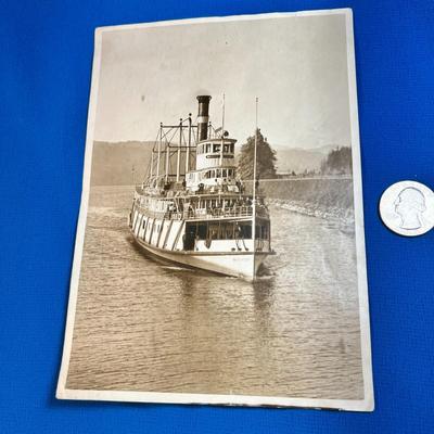 SEPIA TONE PRINT OF PHOTO OF STEAM BOAT