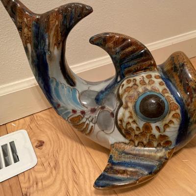 Large pottery fish with shells inside