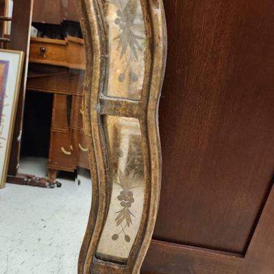 Oval etched, beveled mirror