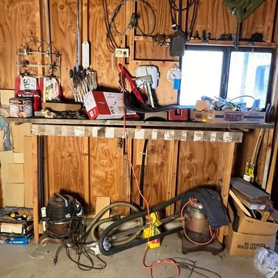 Garage wall & workbench of stuff