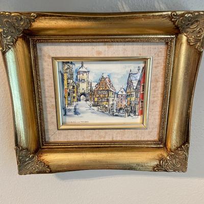 Oil painting with village and water with Rothenburg pillow