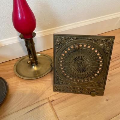 Brass candle holders, trinket box and some kind of calendar