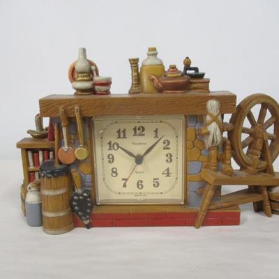 New Haven Plastic Clock Colonial Fireplace Spinning Wheel