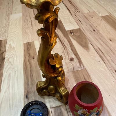 Small wood bird and cup with tall gold candle holder
