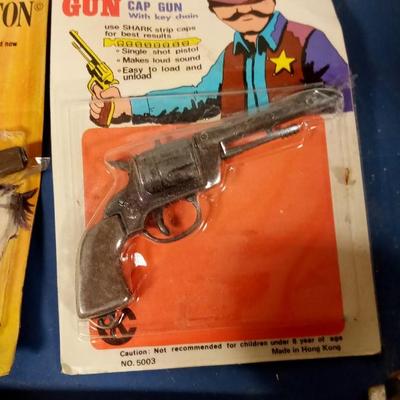LOT 134 TWO OLD CAP GUNS