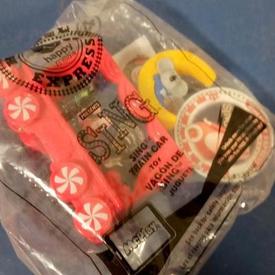 LOT 137 FOUR HAPPY MEAL TOYS IN BAGS