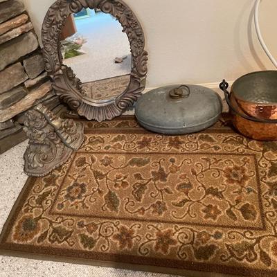 Rugs, mirror oil and copper pot